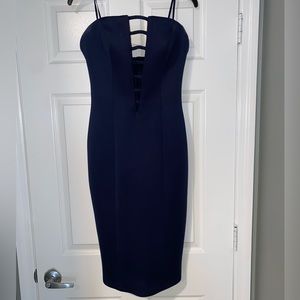 Navy blue, low cut, boned cocktail dress. Thick material, worn once.